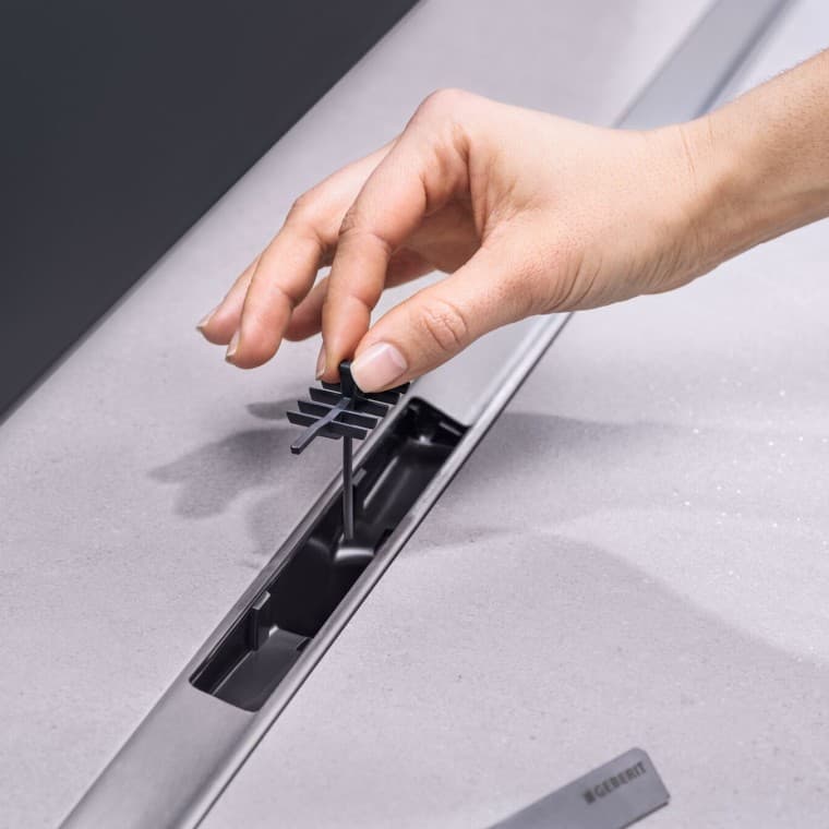 Colocación manual del filtro anticabellos Colocación manual del filtro anticabellos